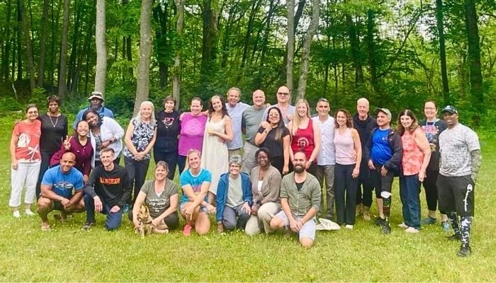Stress Is Gone community members gathered outdoors